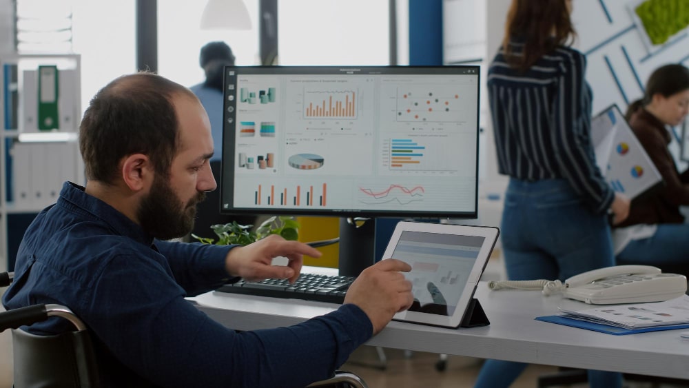 Man Using Power BI For Business Analytics